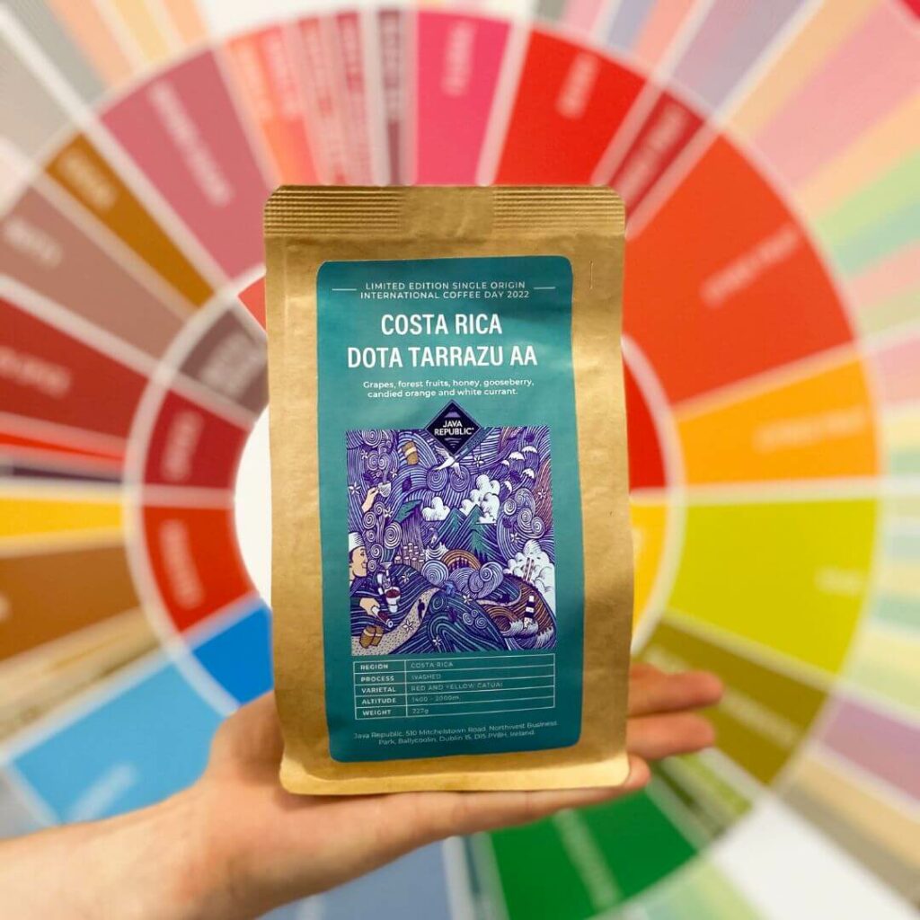 Hand holding our International Coffee Day limited edition, single origin coffee from Costa Rica