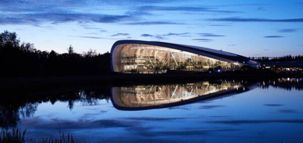Night time shot of a hotel on a lake