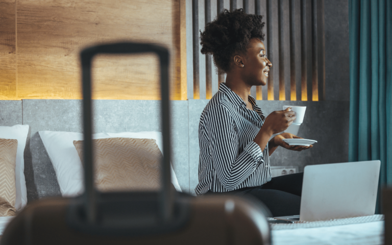 Woman drinking coffee in a hotel