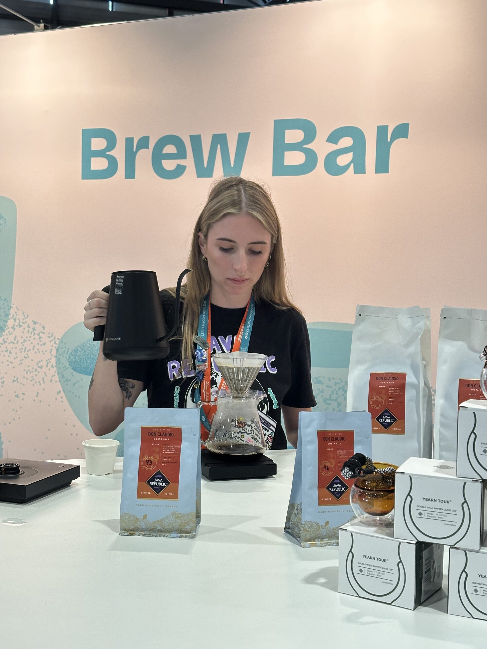 Aisling Alex at World of Coffee in Geneva on the WCC Brew Bar serving filter coffee