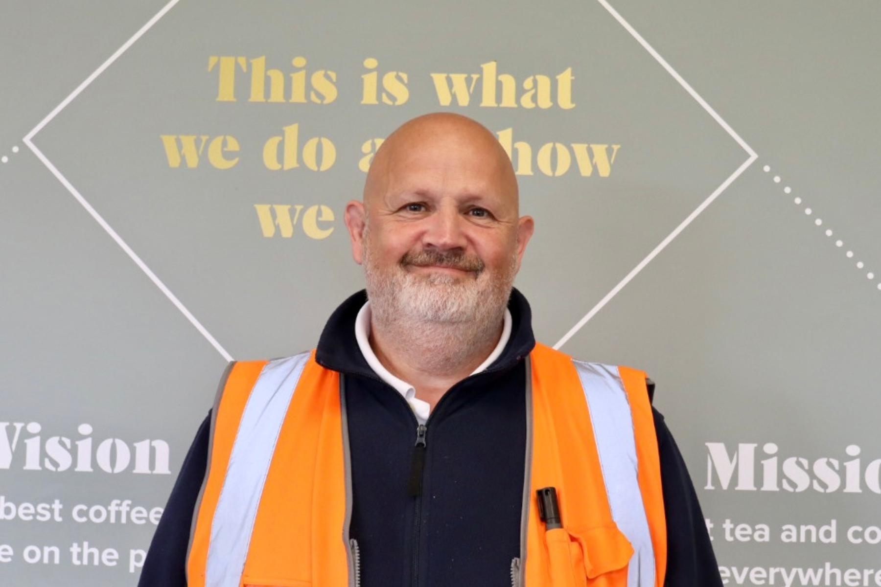Derek Casserly - man in orange high-vis jacket